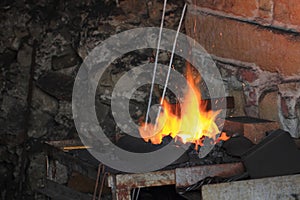 Old smithery and fire