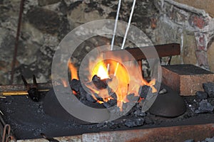 Old smithery and fire photo