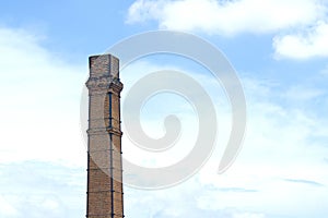 Old smokestack In the blue sky