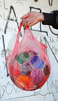 Old soccer bal in nylon bag