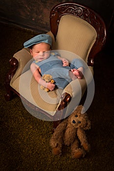 Old sofa with sleeping baby