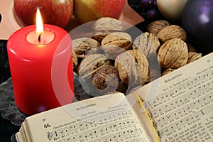 Old songbook and christmas decoration photo