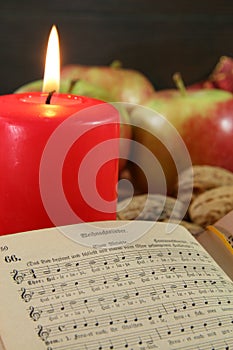 Old songbook and christmas decoration photo