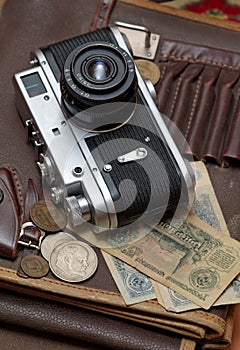 Old soviet film camera and money