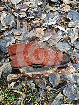 Old Soviet horse made of red leather on sheets