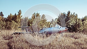 Old soviet L-29 trainer aircraft plane in field photo