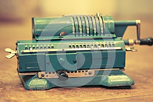 Old Soviet metal mechanical retro calculator adding machine