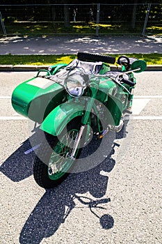 Old Soviet motorcycle URAL with a stroller