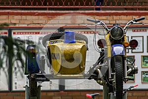 The old Soviet police motorcycle as a monument.
