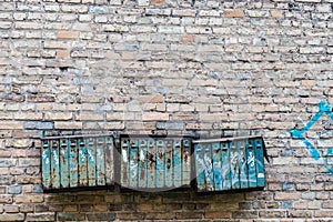 Old Soviet-style mailboxes. Old metal and numbered mailboxes on brick wall