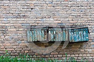 Old Soviet-style mailboxes. Old metal and numbered mailboxes on brick wall