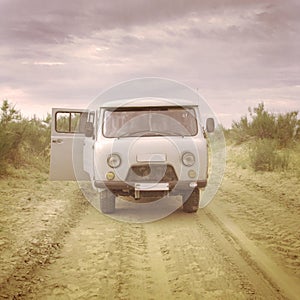 Old soviet style minibus in the desert