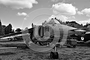 Aviation museum in Latvia. Old Soviet Union military plane. Black and white image