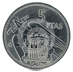 Old Spanish coin of 5 pesetas, Francisco Franco isolated on a white background