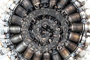 Old spark plugs arranged in a circle