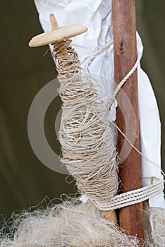 Old spindles with wool