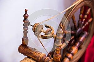 Old spinning wheel close up