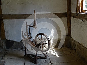 An old spinning wheel in an old dutch farm