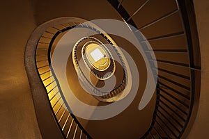 Old spiral staircase in the lighthouse, swirl stair, retro and vintage round indoors architecture.
