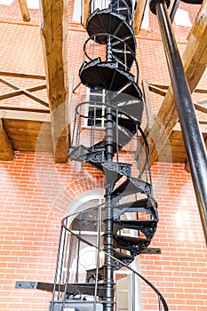 Old spiral staircase made of cast iron in the water tower