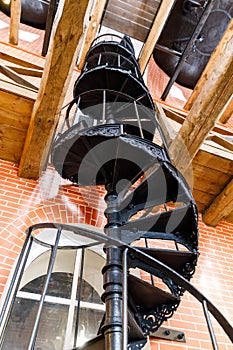 Old spiral staircase made of cast iron in the water tower