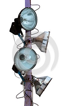 Old spot light projectors on metal pole