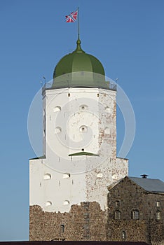 Old St. Olaf tower close-up on a sunny day. Vyborg castle