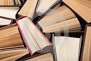 Old stacked books on table