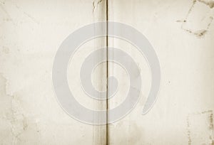 Old stained open book. Background texture