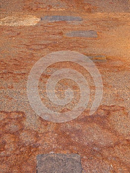 Old stained rusting steel floor with industrial grip texture