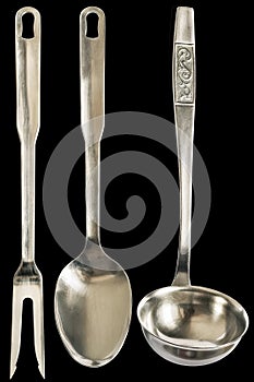 Old Stainless Steel Cutlery Meat Carving Fork With Serving Spoon And Soup Ladle Isolated On Black Background