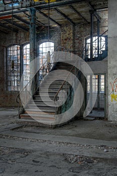 Old staircase in an abandoned hall