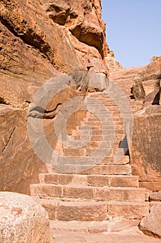 Old stairs leading to temple on the cliff