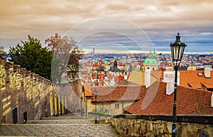 Old Stairs Prague Castle hill and cityscape at sunset Czech Republic