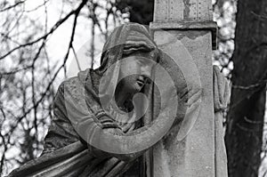 Old statue of angel on the graveyard