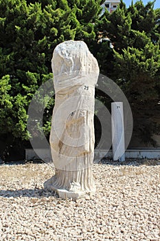 Old statue without head at Serapeum and Pompey`s Pillar and monuments area