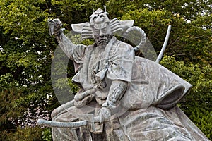 Old statue in Senso-ji temple park