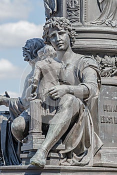 Old statutes of fairytale personages at Elbe river bank in historical downtown, citycenter of Dresden, Germany photo