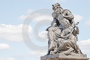 Old statutes of fairytale personages at Elbe river bank in historical downtown, citycenter of Dresden, Germany photo