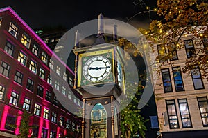 Old Steam Clock in Vancouver`s historic Gastown district at night photo