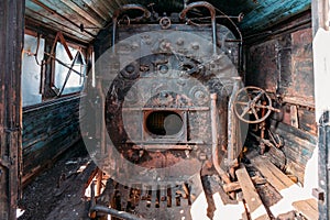 Old steam engine of abandoned steam locomotive Inside driving cabin