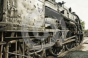 Old steam engine, HDR image with black gold filter