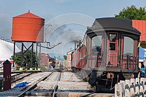 Old steam engine iron train water tank