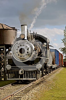 Old steam engine locomotive and train