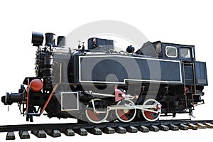 An old steam locomotive without carriages stands on the rails on a clean white background with clipping. Photographed from the