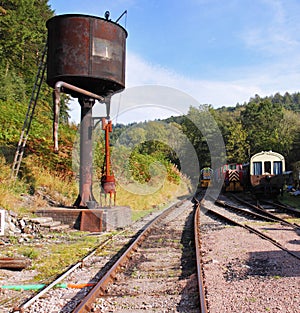Old Steam Railroad Tracks and rusting Water Tower