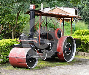 Old steam roller machines for laying of asphalt