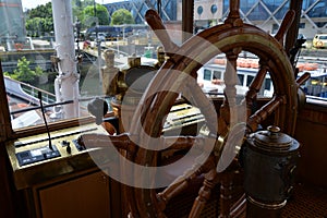 Old steamboat bridge, steering wheel and commanding gear