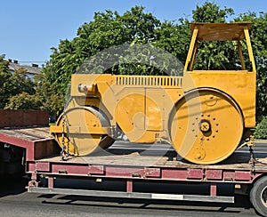 Old steamroller on a trailer