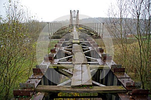 Old steel riveted and forgotten bridge